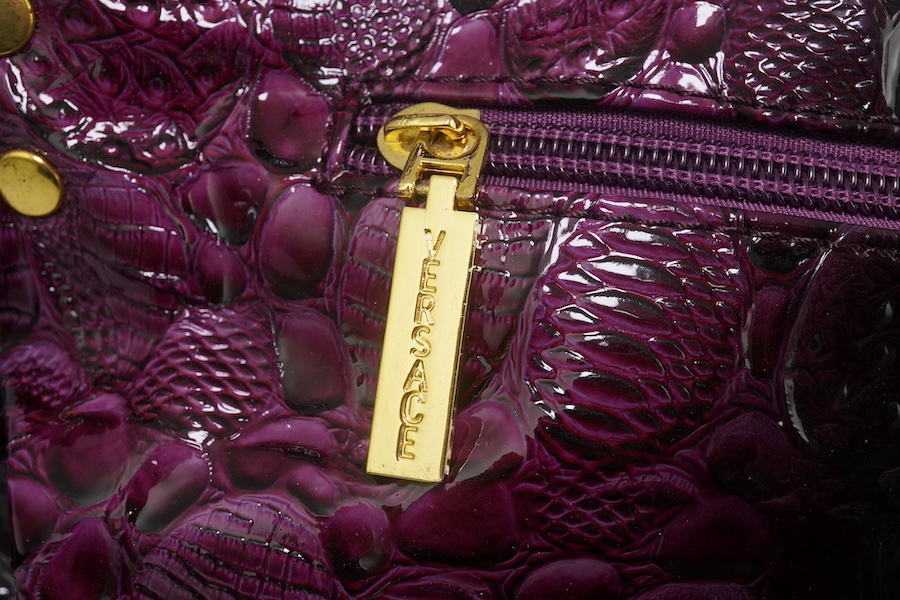 A purple patent Versace large handbag